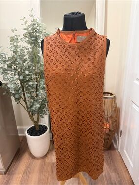 Space couture
Orange Embellished Sleeveless Dress